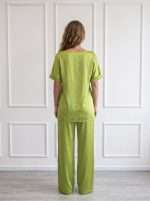 Retro completo donna elegante Chiara Bruni con pantalone ampio